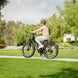 Man riding Kingbull Black Discover electric bike in outdoor setting showcasing versatility